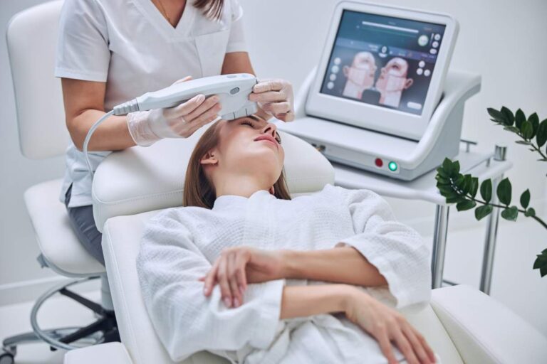 Close-up of a person examining a skincare product label in a brightly lit bathroom.